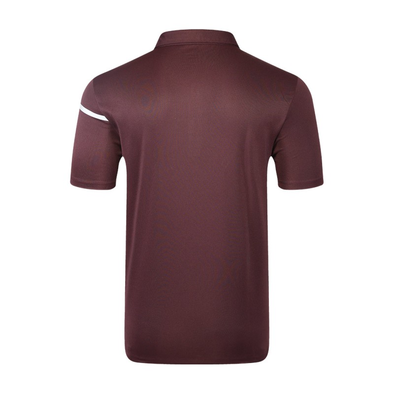 Male model wearing a maroon Cross Court Polo T-Shirt by KTM CTY, featuring a buttoned collar and a distinctive white chest stripe 1