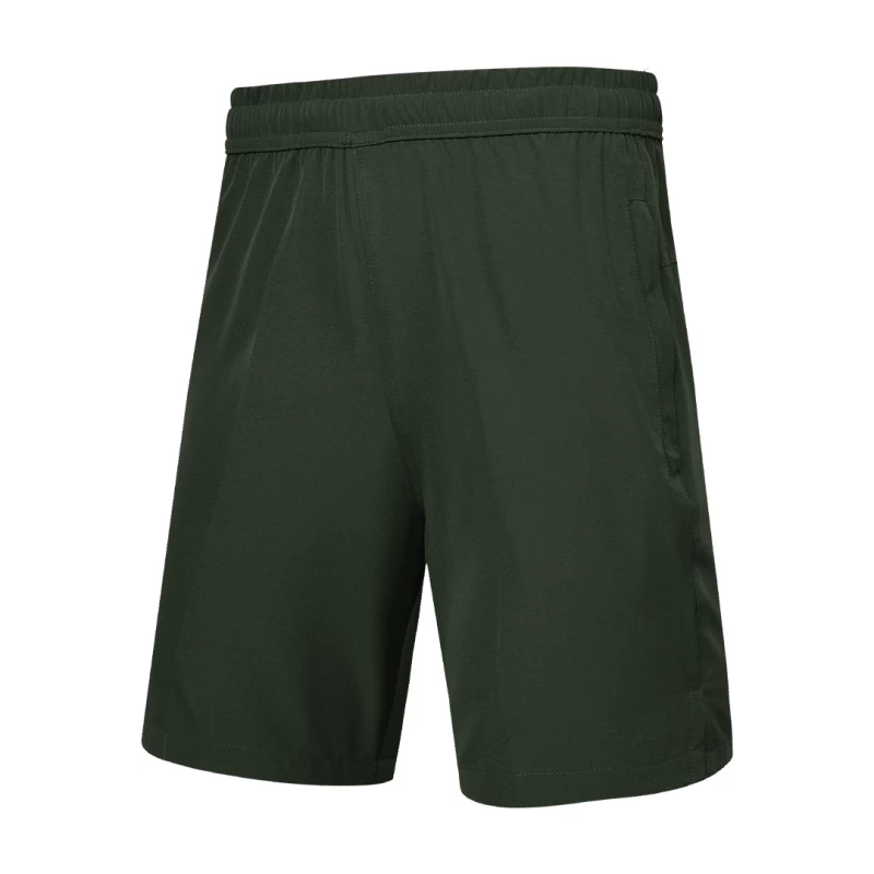 Detail shot of a man wearing comfortable grey-blue KTM CTY Aerfofit half pants, shorts, featuring a secure zip pocket and small side slits at the hem for ease of movement 2