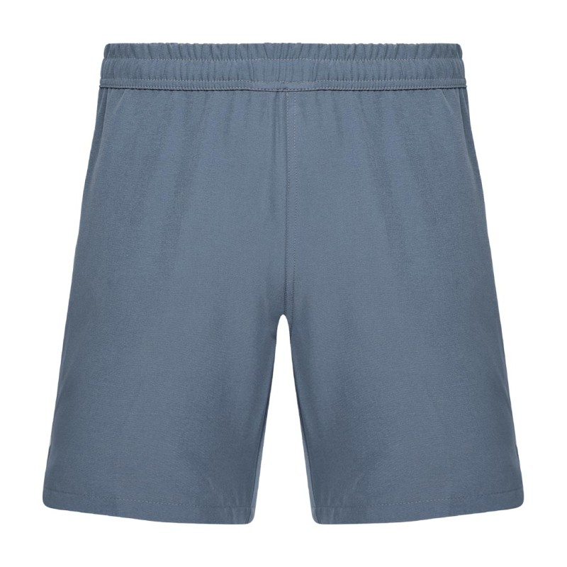 Detail shot of a man wearing comfortable grey-blue KTM CTY Aerfofit half pants, shorts, featuring a secure zip pocket and small side slits at the hem for ease of movement 1