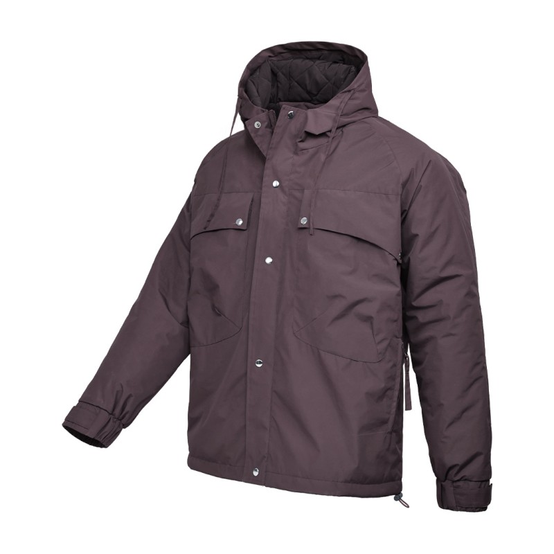 A male model wearing sunglasses and a heavy-duty, navy blue KTM CTY Cargo Shield Hoodie Winter Jacket, featuring a thick hood, snap-button front and multiple cargo pockets for cold weather protection. 4