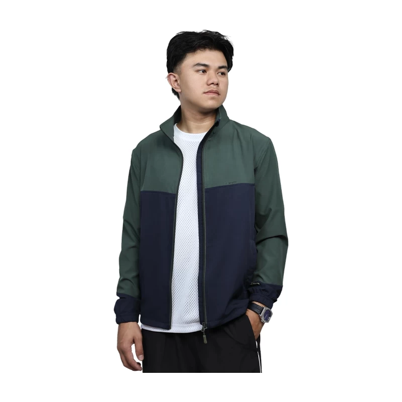 KTM CTY Kinetic Dual windcheater jacket in green and navy, worn by male model