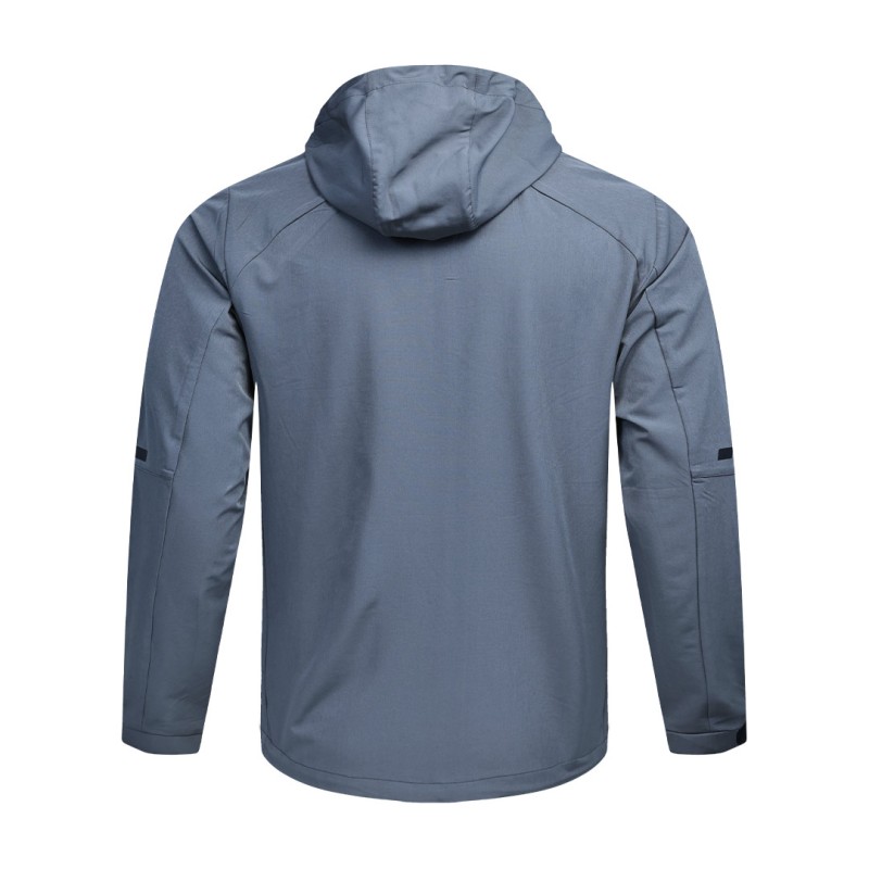 A solid grey KTM CTY Metro Shift Windbreaker jacket featuring a full front zipper, an adjustable hood, and contrasting black zippered side pockets for a sleek, modern look. 1