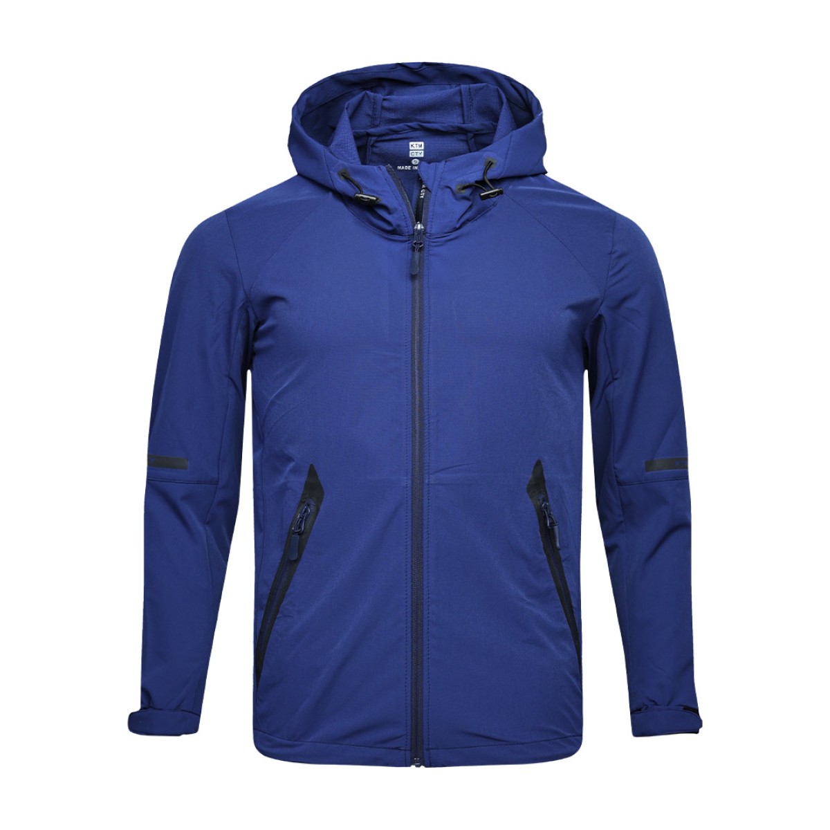 A solid grey KTM CTY Metro Shift Windbreaker jacket featuring a full front zipper, an adjustable hood, and contrasting black zippered side pockets for a sleek, modern look. 2