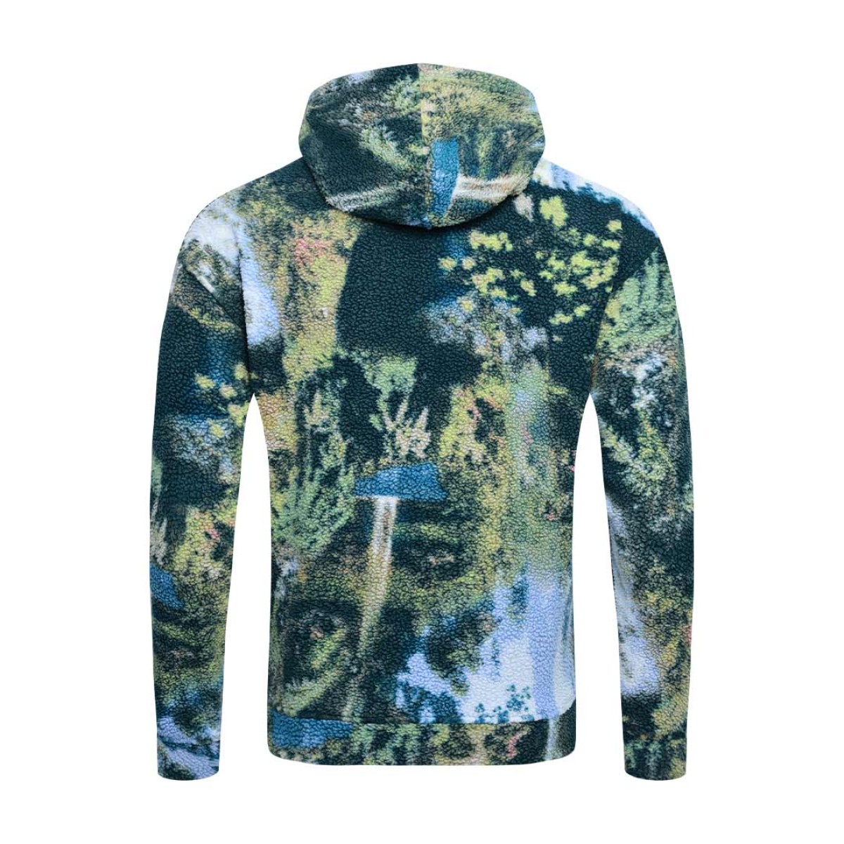 Model styling the KTM CTY Oversize Emberprint Sherpa Hoodie, featuring a warm, textured fleece with an earthy brown, green, and cream abstract pattern, oversized fit, with her hands in the front kangaroo pocket 7