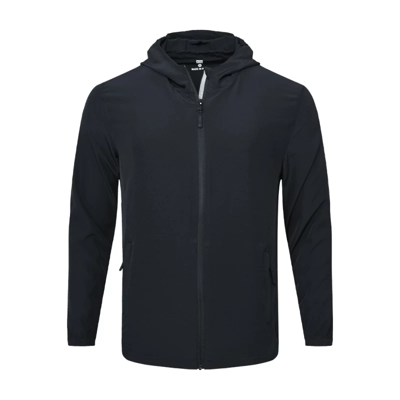 Male model wearing a light grey KTM CTY Swiftlayer Summer Wear Windcheater, a lightweight zip-up Windguard jacket featuring a hood, elastic cuffs, men's windproof windcheater for bike riding 0