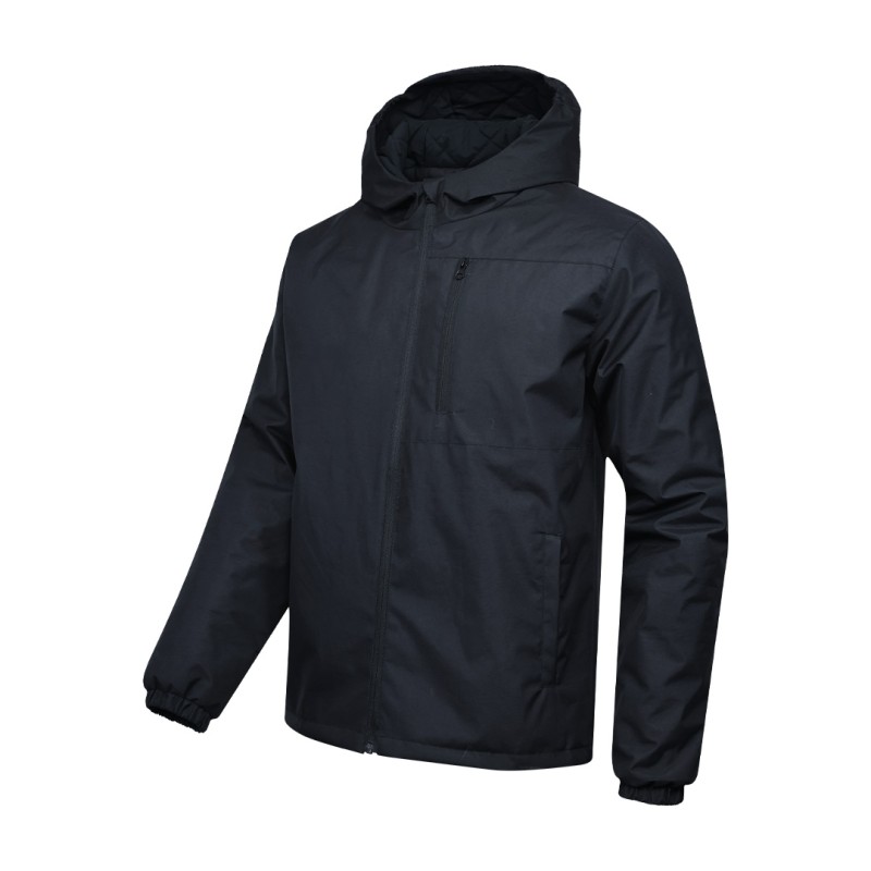 A male model wearing sunglasses and a navy blue KTM CTY Trailhawk Jacket, featuring an insulated, padded design with a full front zipper and hood for winter weather protection. 0