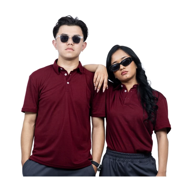 A male and female model wearing matching maroon KTM CTY polo tshirts and sunglasses, standing confidently against a white background. The female model is resting her arm on the male model's shoulder