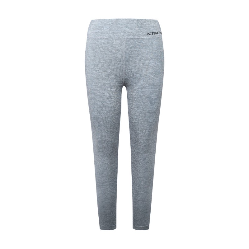 KTM PRO mint green high waisted leggings worn by female model during workout or at gym paired with black crop top and sneakers on white background 3
