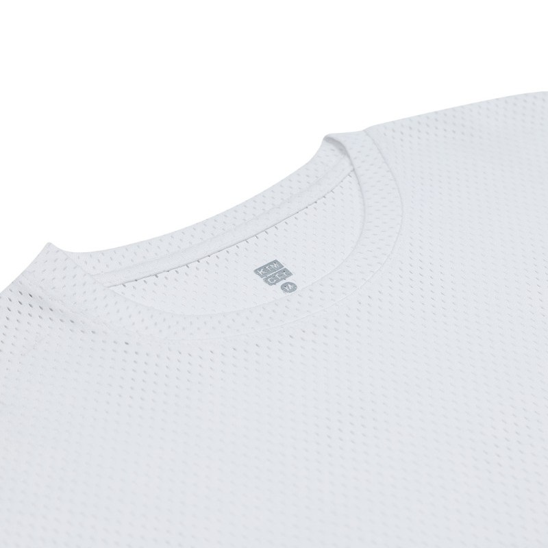 A male model wearing a white, sleeve t-shirt with a textured, perforated mesh design 2