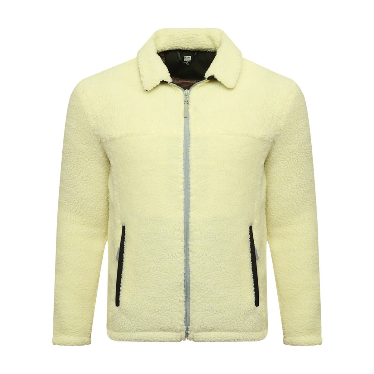 A model wearing a cream-colored sheep polyfiber unisex winter jacket featuring a classic fold-down collar, a full front zipper and hands resting in the side pockets 1