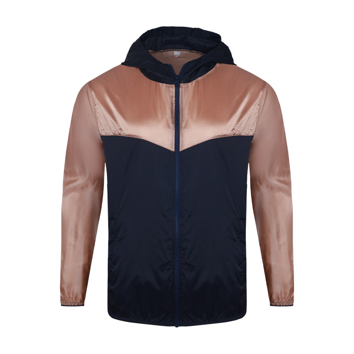 Front view of a male model styling a vibrant red and blue color-block lightweight windcheater jacket. This casual Unisex Windbreaker Jacket features a full zipper and a protective hood, making it a great outer layer for summer wear jacket. 2