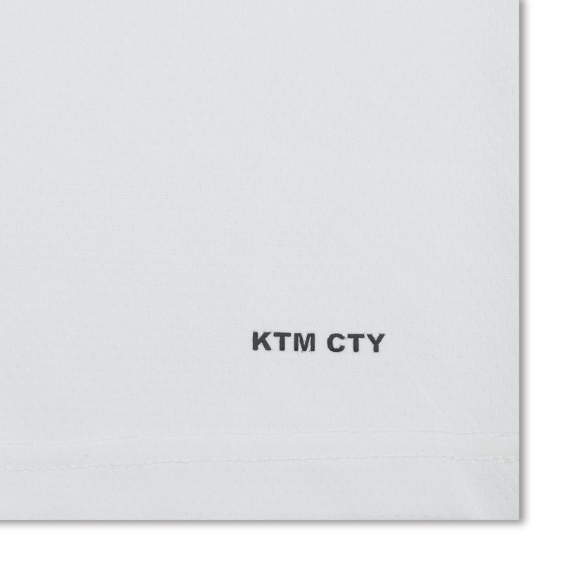 A solid white KTM CTY Unisex Half Sleeve crew neck t-shirt featuring a clean, minimalist design with a small discreet logo on the bottom hem. 4