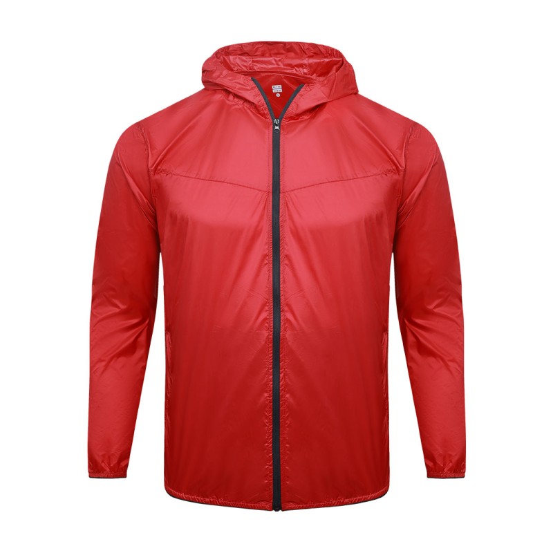 A male model adjusting the zipper of the lightweight, solid red Velocity Breeze Windcheater Jacket with hoodie, featuring a hood and a contrasting black front zipper 2